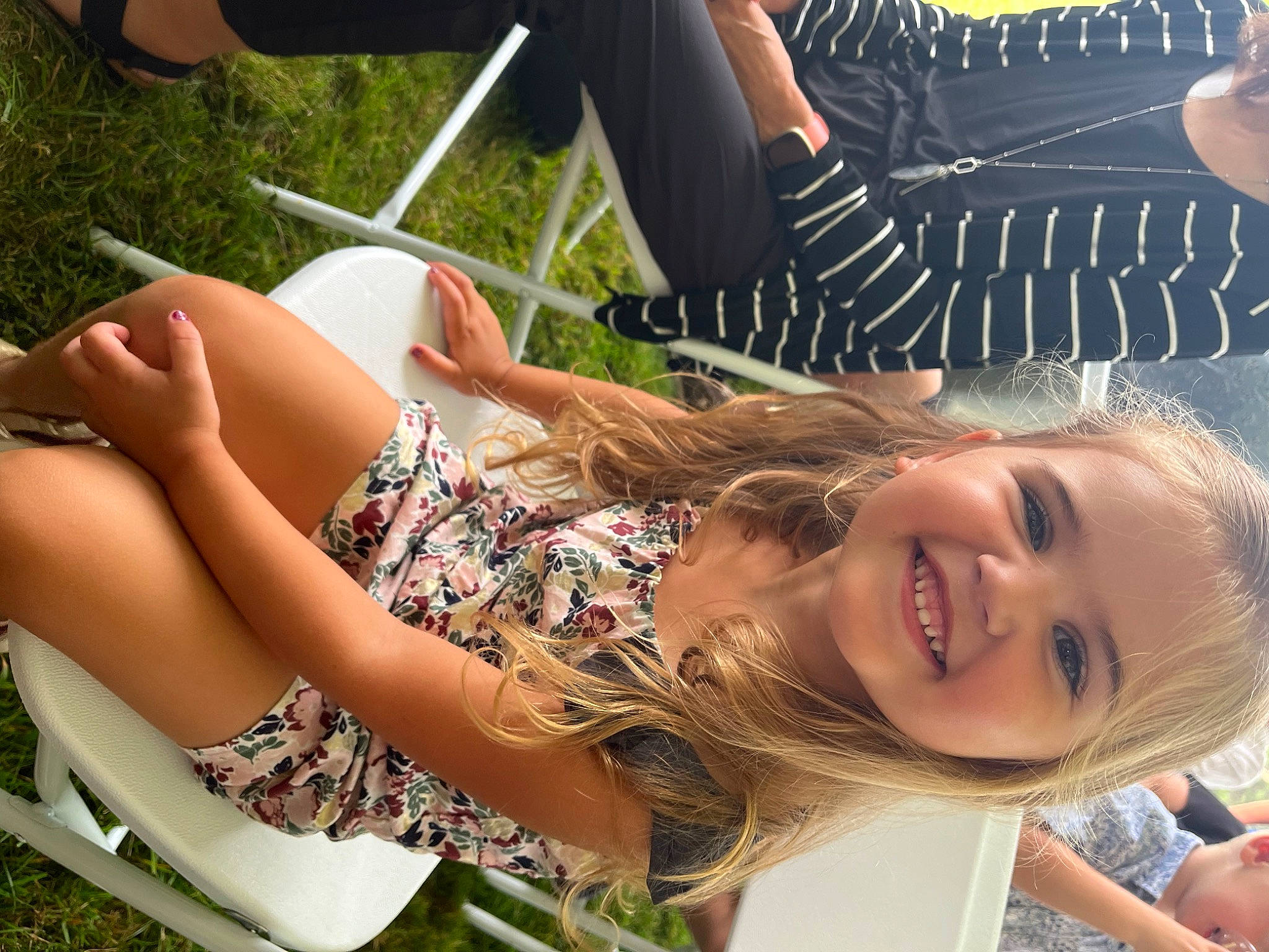 Joslyn is registered to the contest to win money with this photo: beauty, eyewear, grass, hairstyle, happy, human_leg, joy, knee, leisure, light, long_hair, people_in_nature, person, plant, recreation, shorts, skin, smile, summer, sunlight