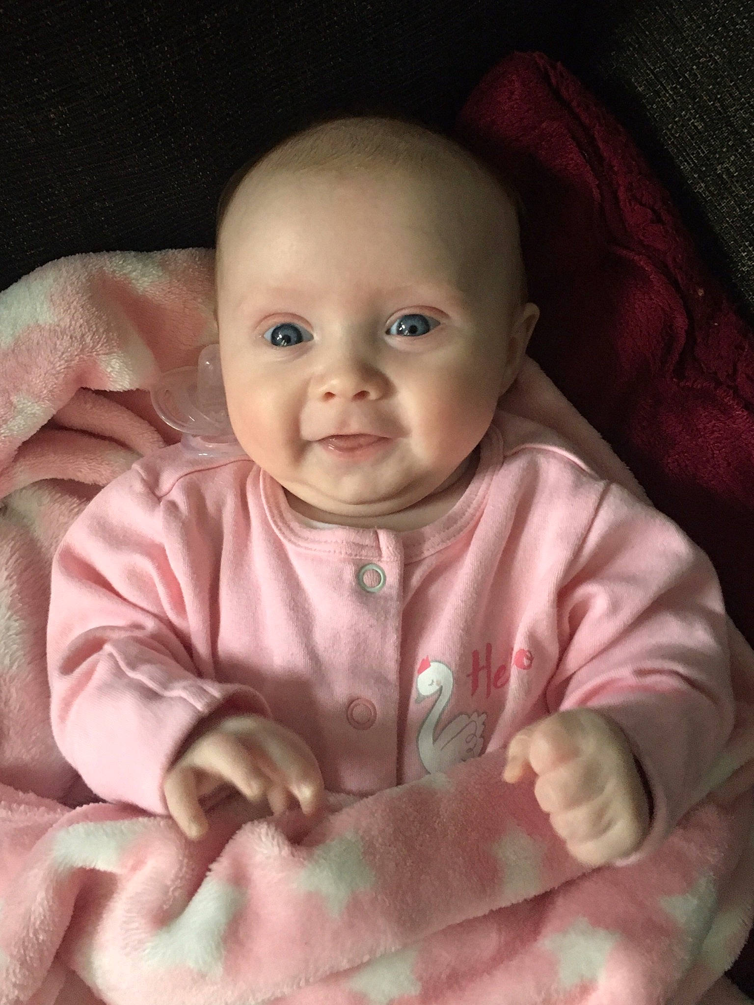 Isabell is registered to the contest to win money with this photo: baby, baby_products, baby_toddler_clothing, cheek, child, comfort, finger, hand, linens, lip, mouth, nose, person, pink, skin, toddler