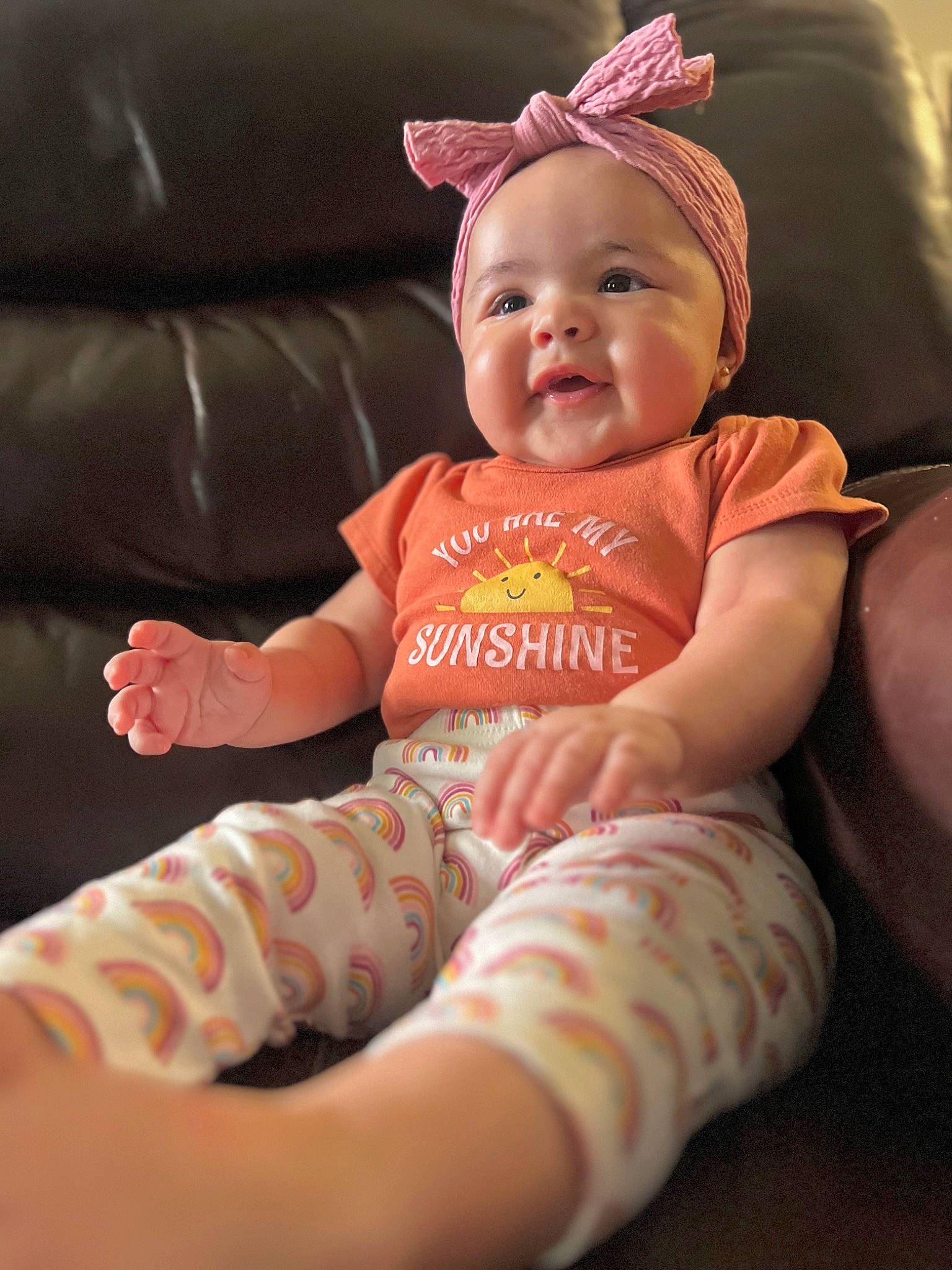 Ema joined the competition — help win amazing prizes! baby, baby_toddler_clothing, cap, cheek, child, comfort, costume_hat, couch, face, finger, happy, head, headwear, human_body, mouth, person, pink, skin, sleeve, smile