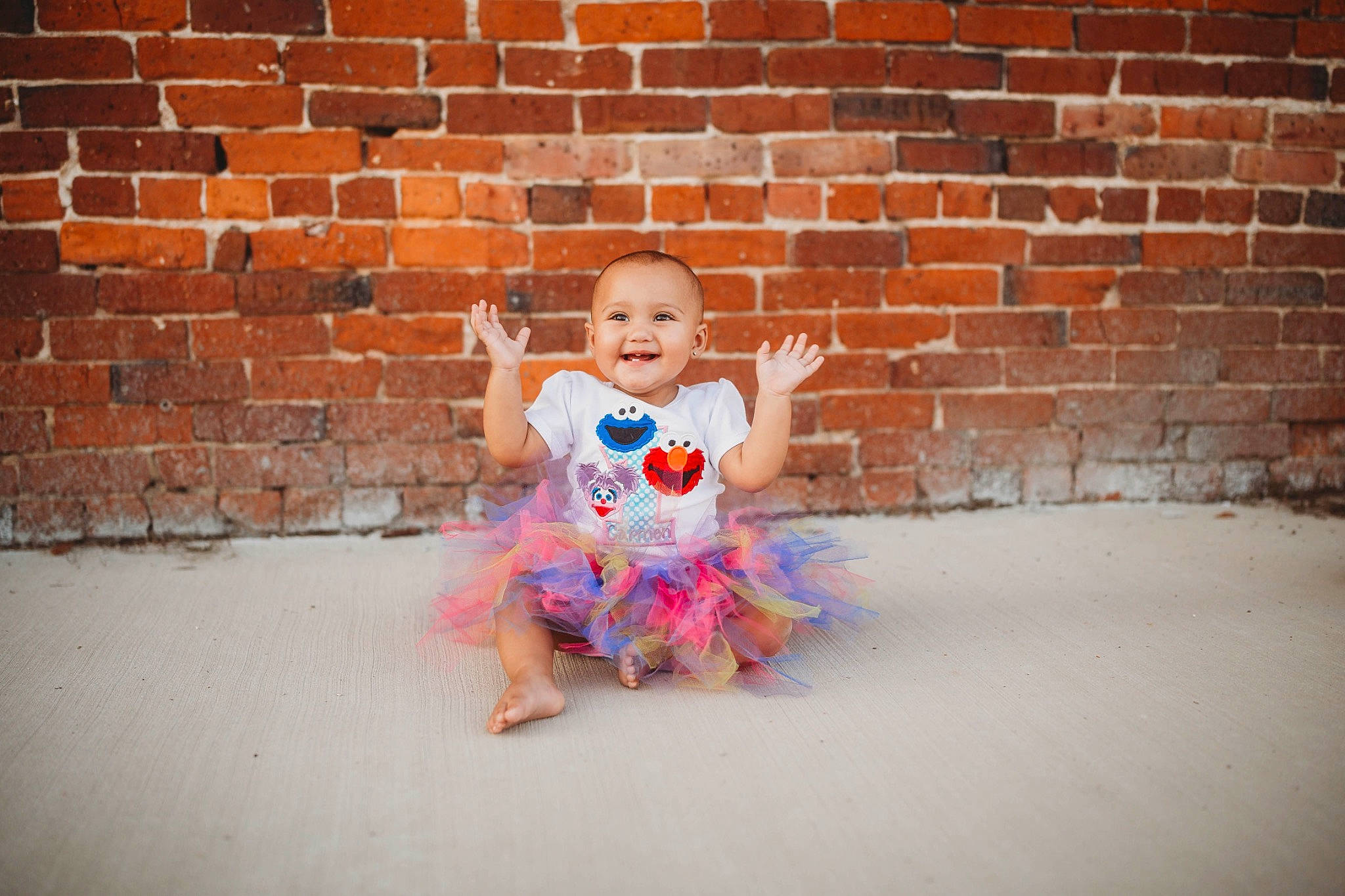 Carmen joined the competition — help win amazing prizes! baby, baby_toddler_clothing, ballet_tutu, barefoot, brick, brickwork, building_material, child_model, embellishment, foot, joy, mortar, nose, person, toddler