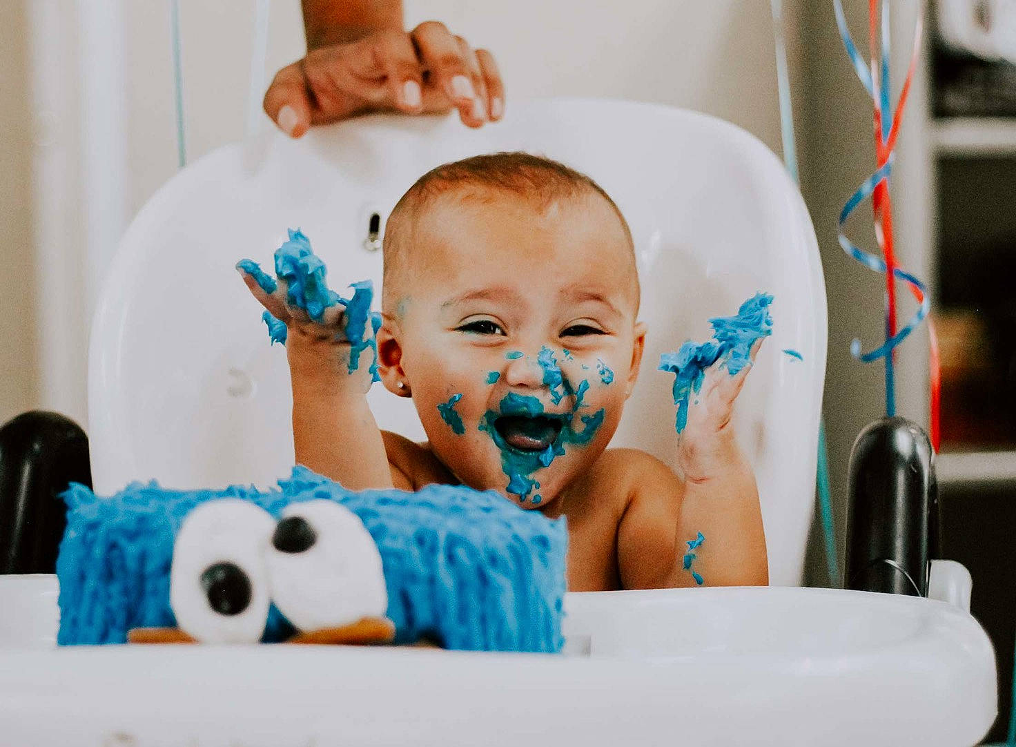 Carmen is registered to the contest to win money with this photo: aqua, baby, baby_bathing, baby_grabbing_for_something, baby_products, baby_toddler_clothing, bathing, cake, cake_decorating_supply, finger, icing, nail, person, personal_care, plush, stuffed_toy, teal, toy, turquoise