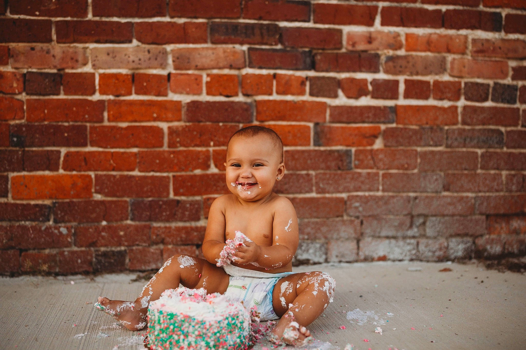Carmen joined the competition — help win amazing prizes! baby, baby_toddler_clothing, brick, brickwork, building_material, child, chocolate, foot, joy, person, stomach, sweetness, toddler, toe, wall