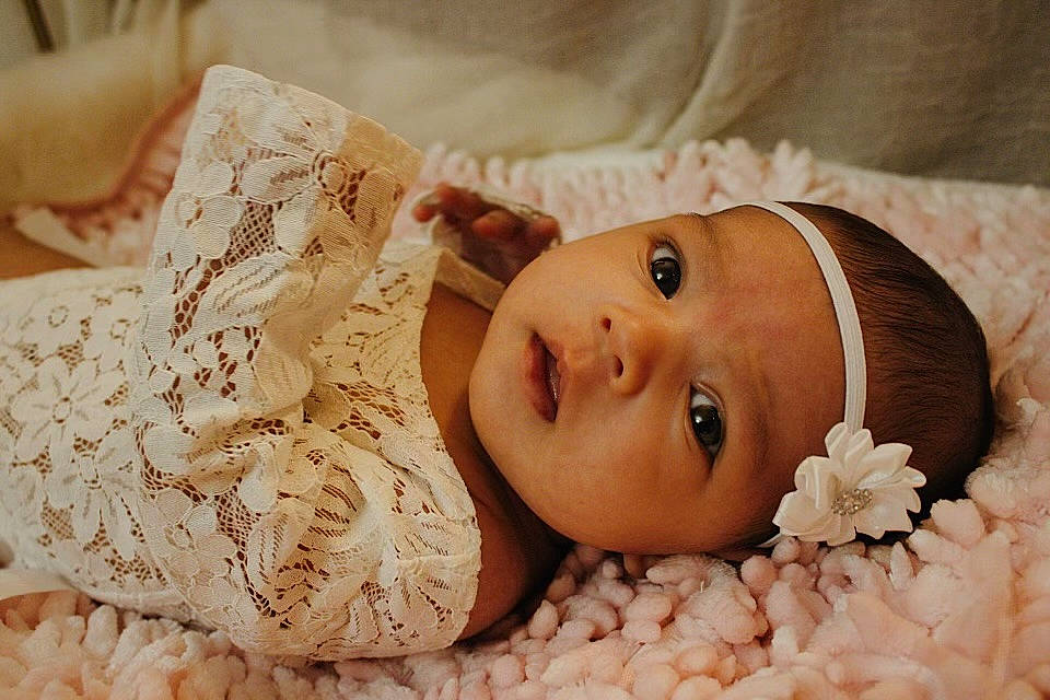 Brooklyn joined the competition — help win amazing prizes! baby, baby_sleeping, baby_toddler_clothing, bedding, child, comfort, eye, eyelash, face, fashion_accessory, fur, hair_accessory, happy, head, headgear, headpiece, headwear, linens, person, petal