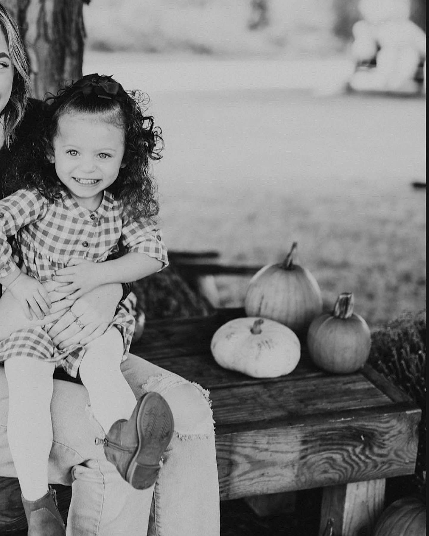 Zaylee joined the competition — help win amazing prizes! black, black_and_white, calabaza, cucurbita, food, fruit, gourd, happy, human_body, joy, natural_foods, person, photograph, pumpkin, shorts, smile, squash, standing, style, white