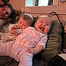 Olive joined the competition — help win amazing prizes! baby, babies, infant, pajamas, smile, laughing, person, couch, pillow, indoor, window, adult, cozy, cute, family, child, happy, home, portrait, relaxing
