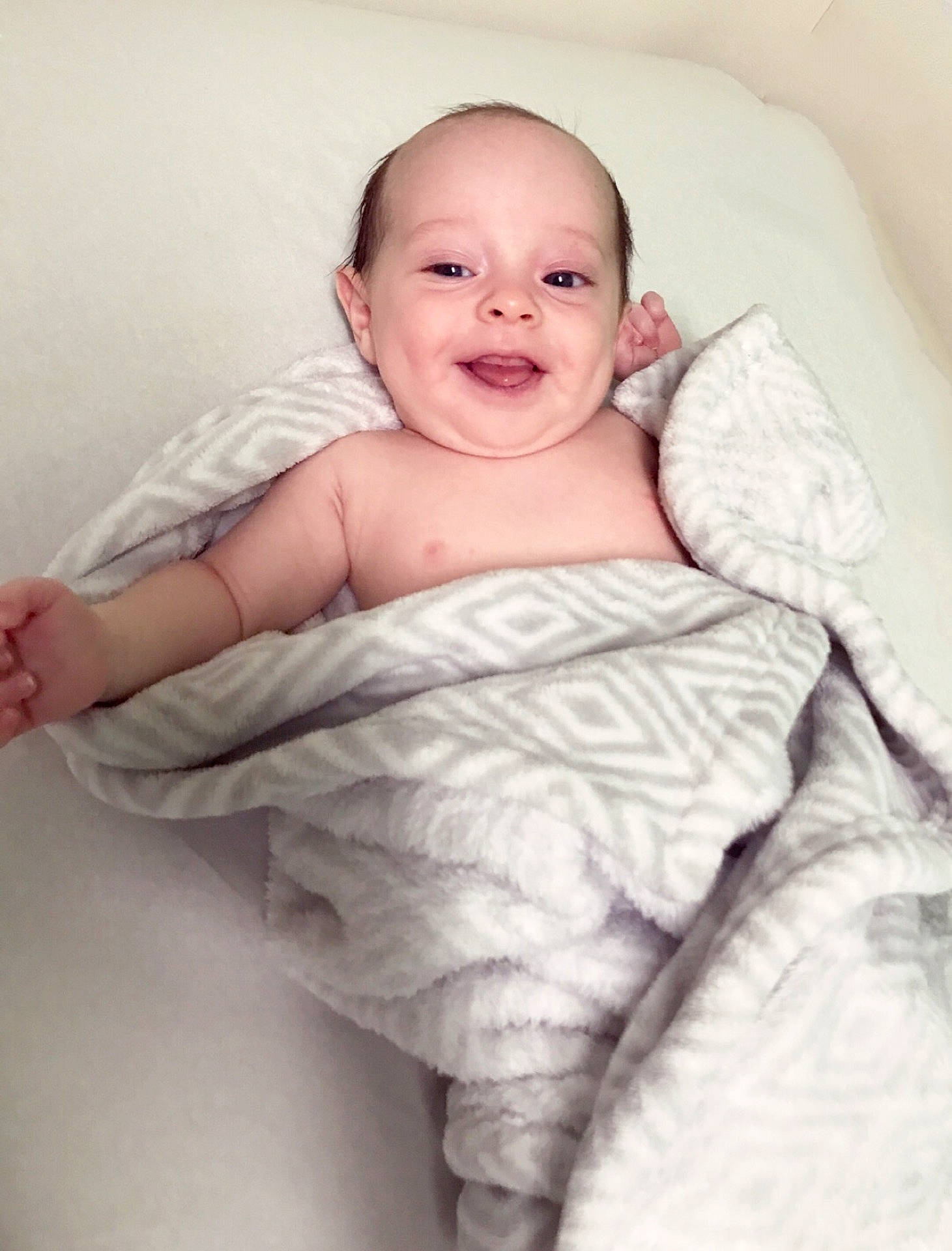 Finnegan is registered to the contest to win money with this photo: child, fur, infant, person, product, skin, smile, textile, toddler