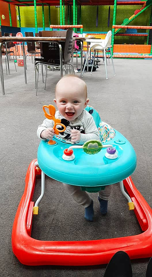 Jayson is registered to the contest to win money with this photo: baby, baby_products, baby_toys, child, fun, joy, leisure, person, play, product, sitting, smile, toddler, toy, vacation