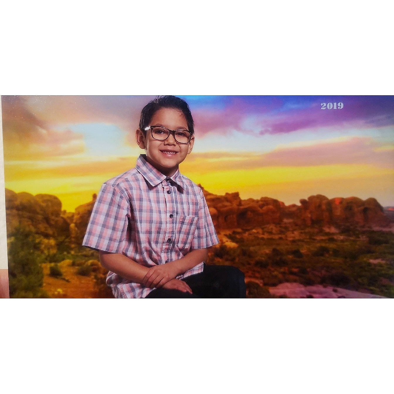 Davian is registered to the contest to win money with this photo: cloud, cool, eyewear, glasses, happy, joy, mountain, person, photograph, photography, portrait, portrait_photography, sky, smile, snapshot, stock_photography, sunset, tourism, travel, vacation