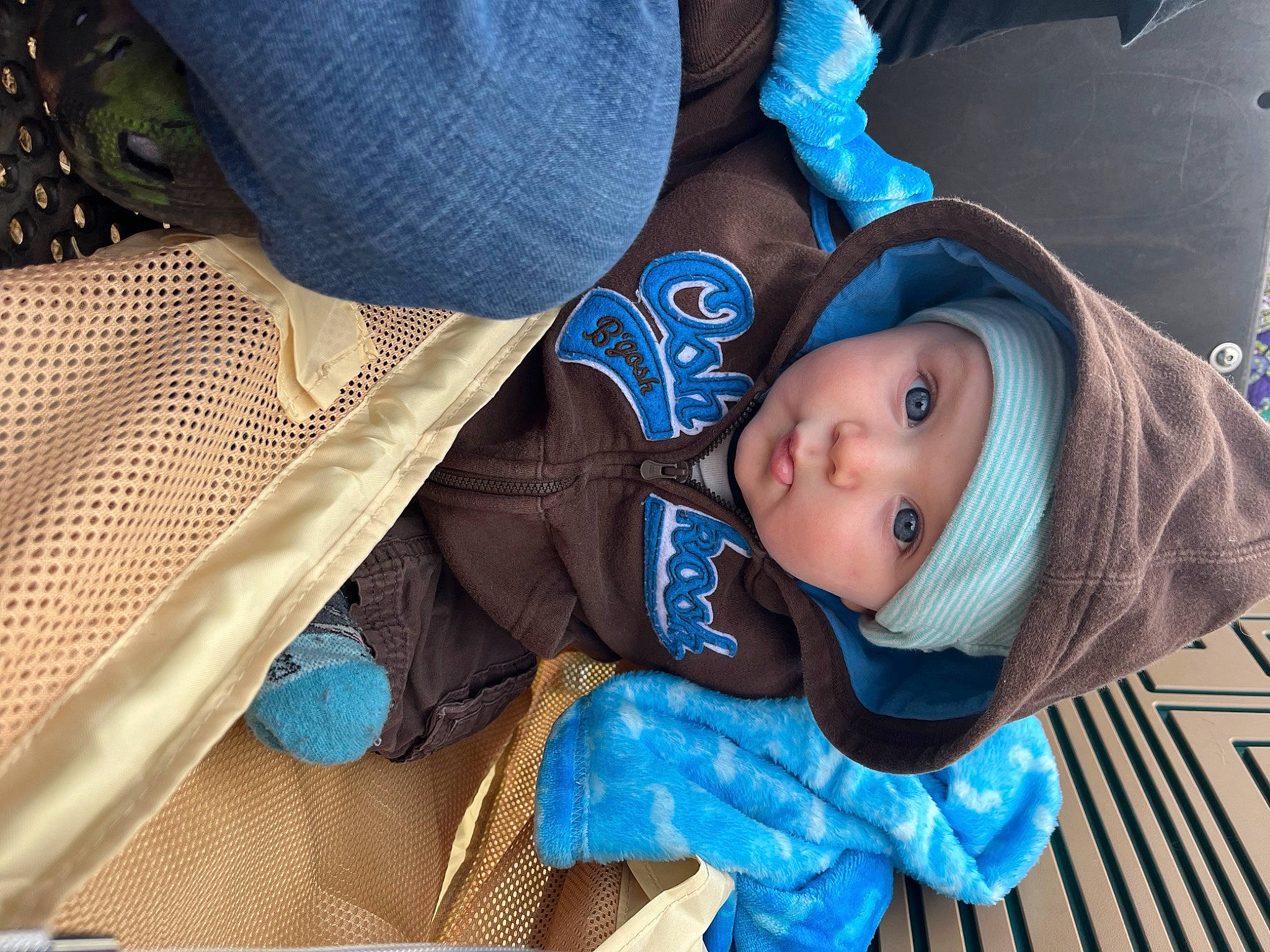 Genesis joined the competition — help win amazing prizes! baby, baby_products, baby_toddler_clothing, blue, cap, child, comfort, cool, electric_blue, fashion_accessory, happy, headgear, headwear, outerwear, pattern, person, purple, skin, textile, toddler