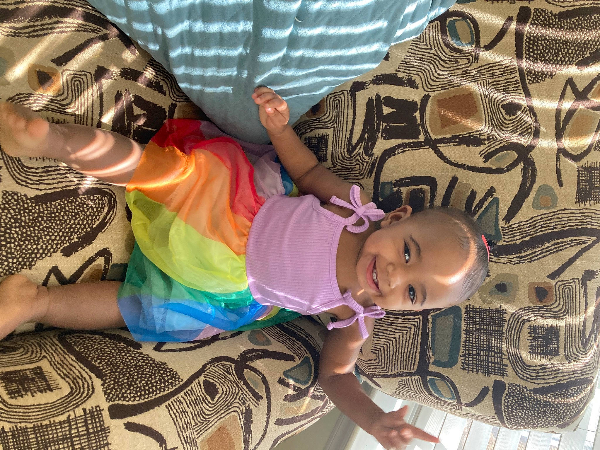 Meilahni Davis is registered to the contest to win money with this photo: arm, beauty, comfort, cool, fashion, fun, hairstyle, hand, happy, human, joy, leg, leisure, mouth, pattern, person, shorts, smile, t_shirt, textile