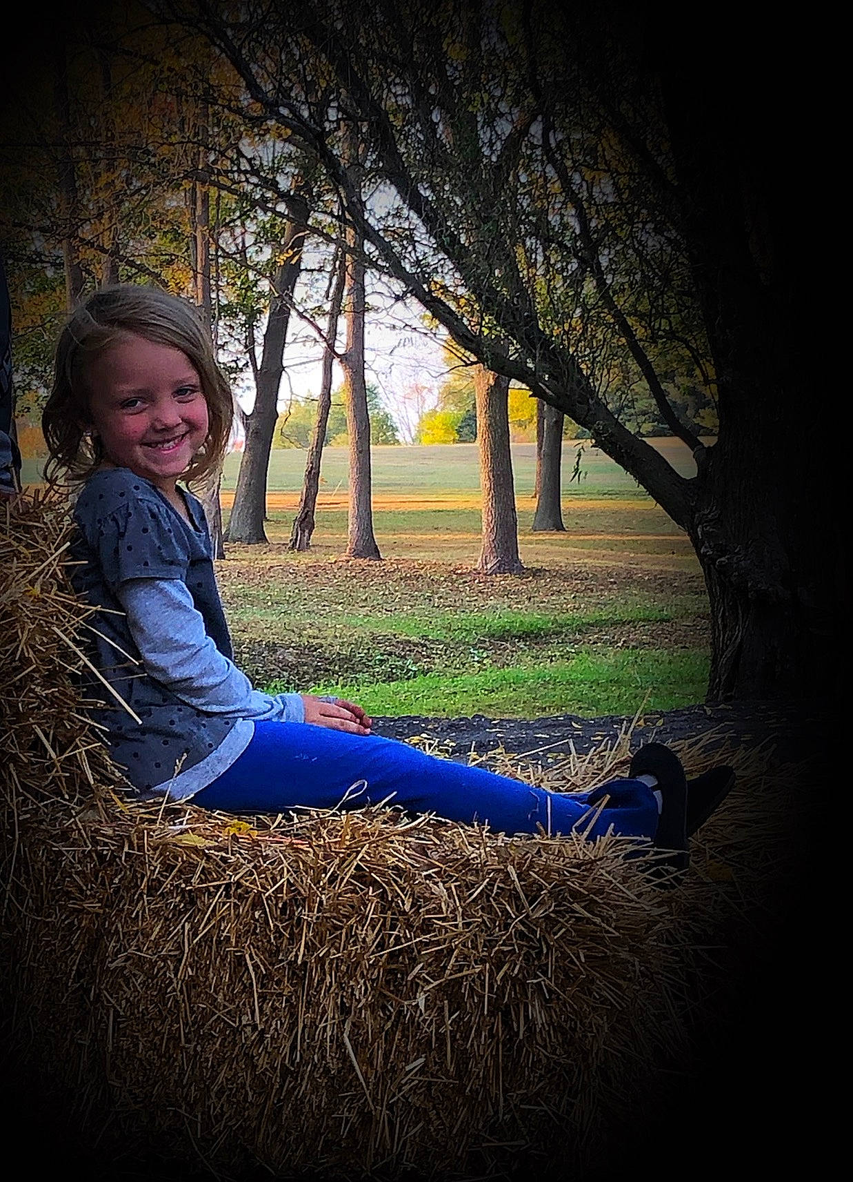 Sterling is registered to the contest to win money with this photo: branch, darkness, electric_blue, flash_photography, forest, grass, happy, joy, leaf, long_hair, natural_landscape, people_in_nature, person, plant, smile, sunlight, sunset, tints_and_shades, tree, trunk