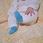Haidyn joined the competition — help win amazing prizes! baby, infant, smiling, blue_headband, blue_socks, white_outfit, blanket, soft_texture, sitting, happy, cute, child, portrait, indoors, cozy, warm, comfortable, playful, small_hand, headband
