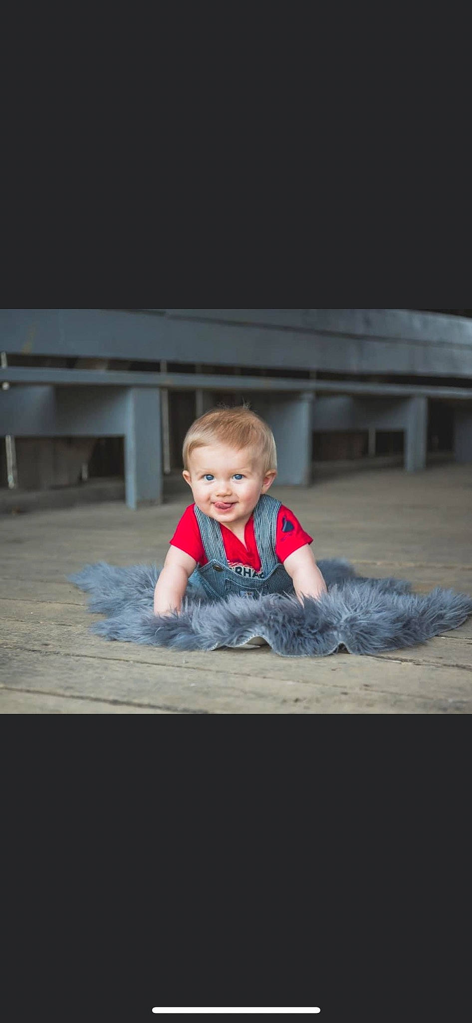 Conner is registered to the contest to win money with this photo: asphalt, baby, baby_toddler_clothing, electric_blue, face, flash_photography, floor, flooring, fun, grass, grey, happy, joy, leisure, person, recreation, sitting, sky, smile, t_shirt