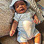 Deomari is registered to the contest to win money with this photo: baby, infant, smiling, clothing, hat, cushion, blanket, indoor, person, child, happy, sitting, sock, cute, skin, light, shadow, fabric, soft, relaxing
