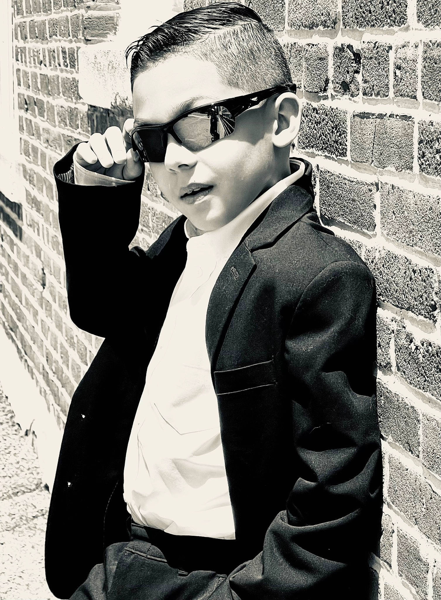 Dillan joined the competition — help win amazing prizes! beard, black, black_and_white, collar, cool, dress_shirt, eyewear, flash_photography, gesture, glasses, goggles, hairstyle, person, photograph, sleeve, smile, standing, style, sunglasses, vision_care