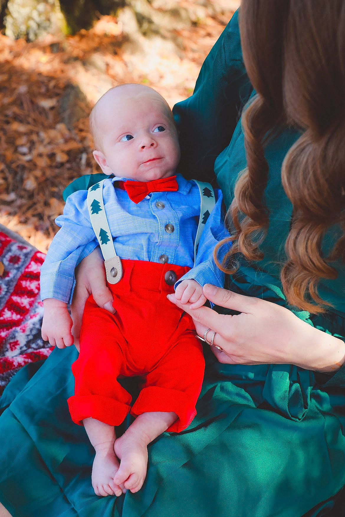 Harrison is registered to the contest to win money with this photo: azure, baby, baby_toddler_clothing, blue, child, dress, electric_blue, event, flash_photography, formal_wear, fun, grass, hand, happy, jewellery, magenta, people_in_nature, person, portrait_photography, sitting