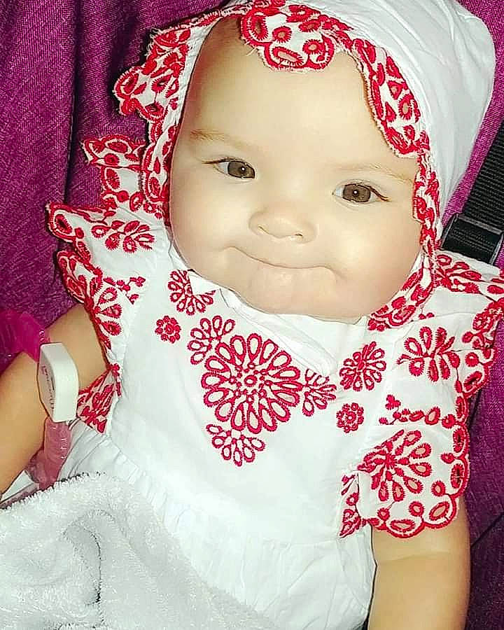 Ariella Rose is registered to the contest to win money with this photo: baby, baby_products, baby_toddler_clothing, cheek, child, face, head, headgear, joy, lip, nose, pattern, person, pink, product, skin, smile, toddler