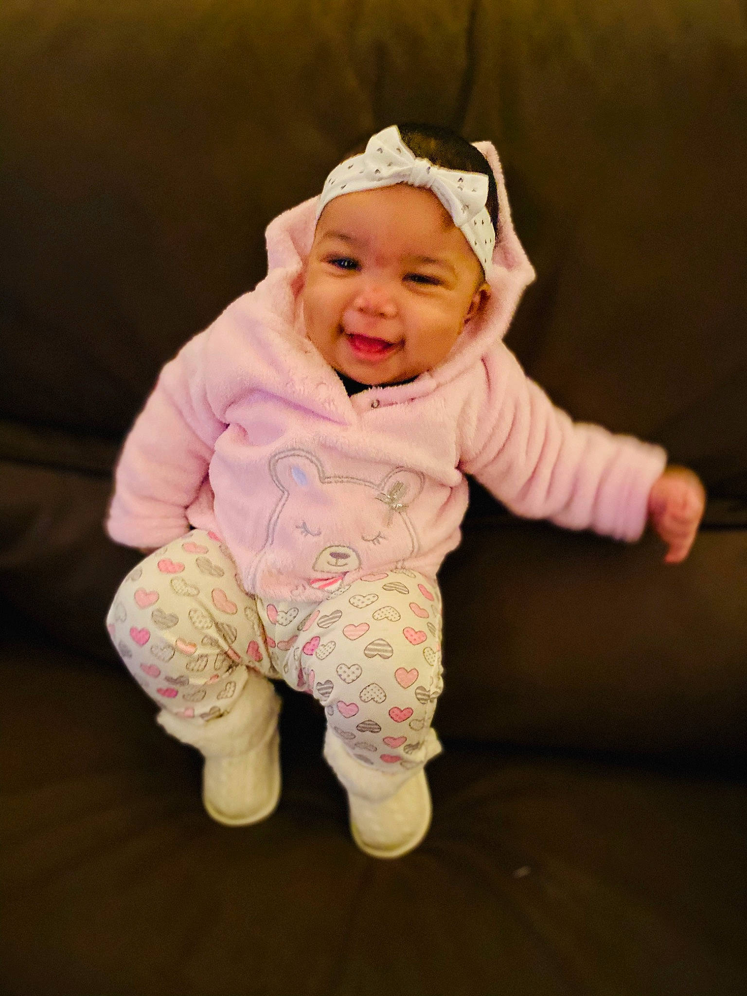 Bayleigh is registered to the contest to win money with this photo: baby, baby_laughing, baby_toddler_clothing, cheek, child, ear, face, facial_expression, fun, happy, head, headwear, laugh, outerwear, people, person, pink, play, skin, sleeve