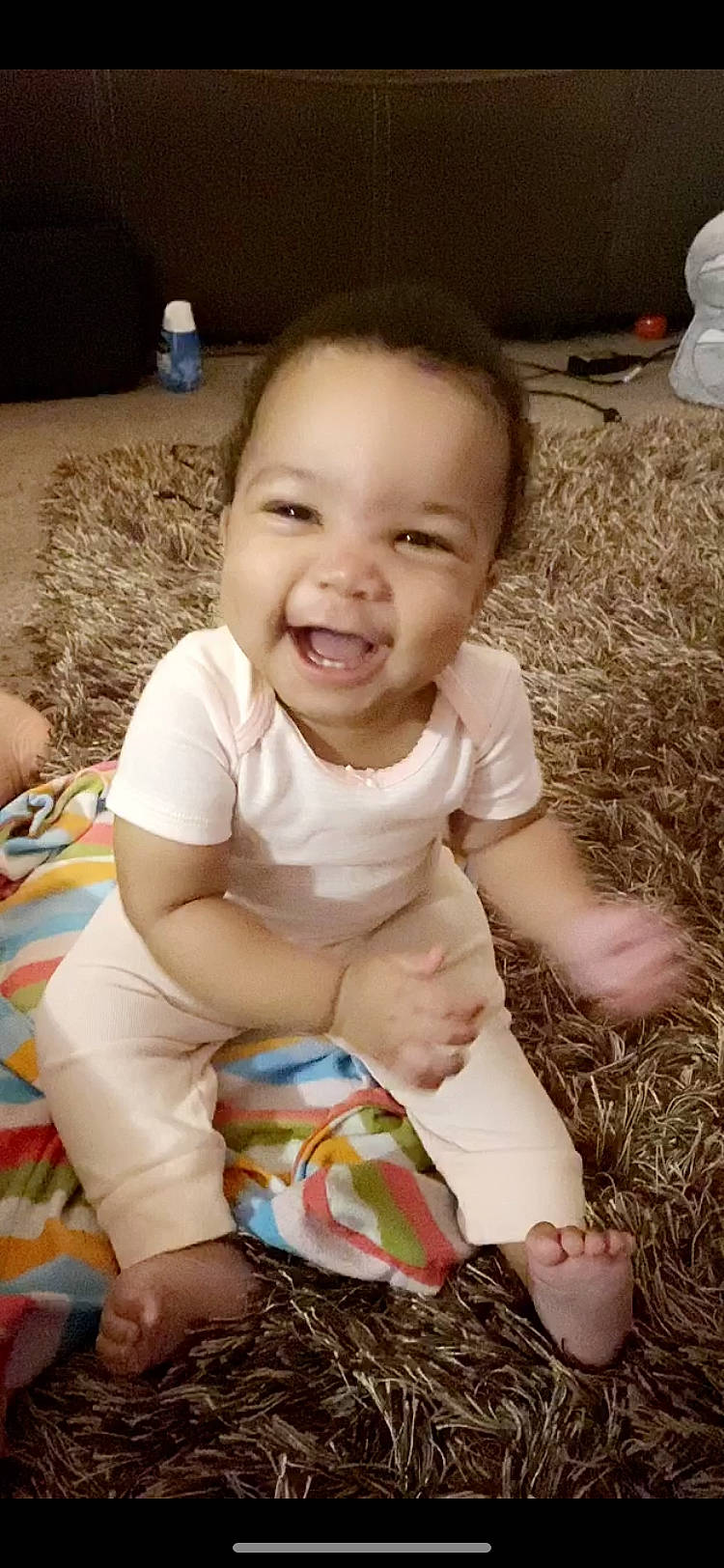 Bayleigh is registered to the contest to win money with this photo: baby, cheek, child, eye, facial_expression, joy, laugh, leg, person, play, sitting, skin, smile, toddler