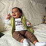 Sajed participe au concours pour gagner de l'argent avec cette photo : toddler, child, smiling, sitting, couch, vest, pants, white_socks, indoor, happy, baby, face, clothing, furniture, cozy, home, portrait, cute, person, casual
