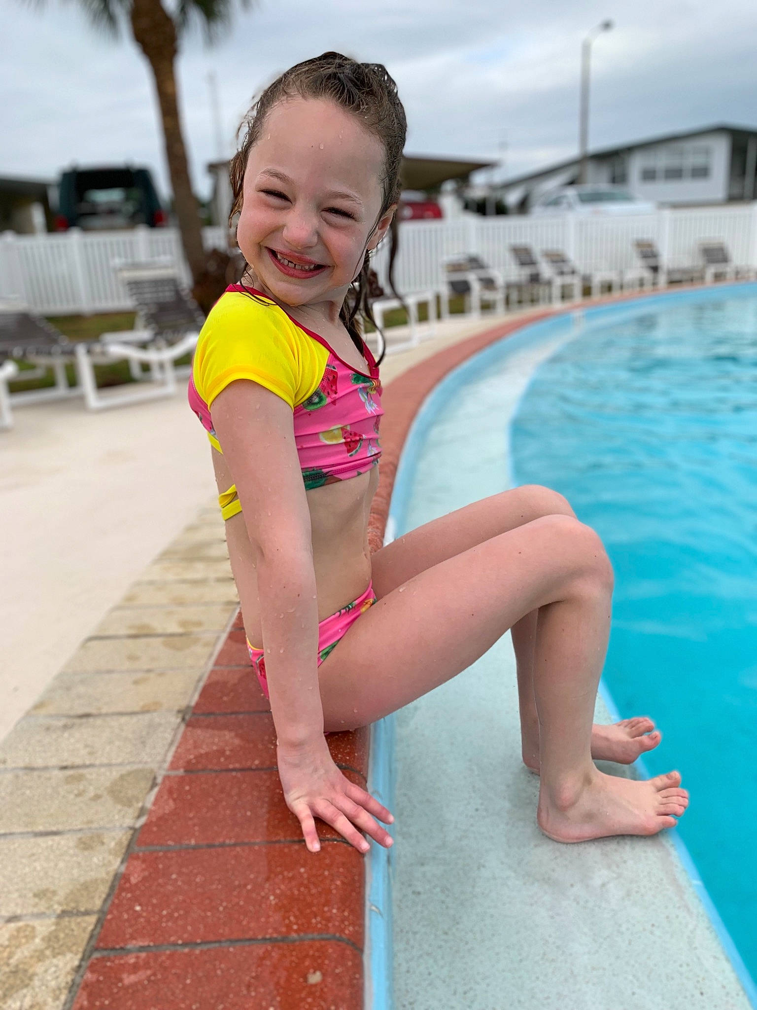 Maya is registered to the contest to win money with this photo: child, fun, joy, leg, leisure, person, personal_protective_equipment, recreation, smile, summer, swimming_pool, swimwear, thigh, toddler, vacation, water_park