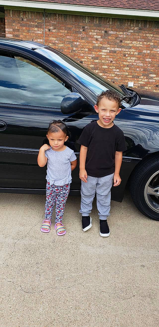 Zayvien is registered to the contest to win money with this photo: car, child, daughter, family_car, joy, luxury_vehicle, person, vacation, vehicle, vehicle_door