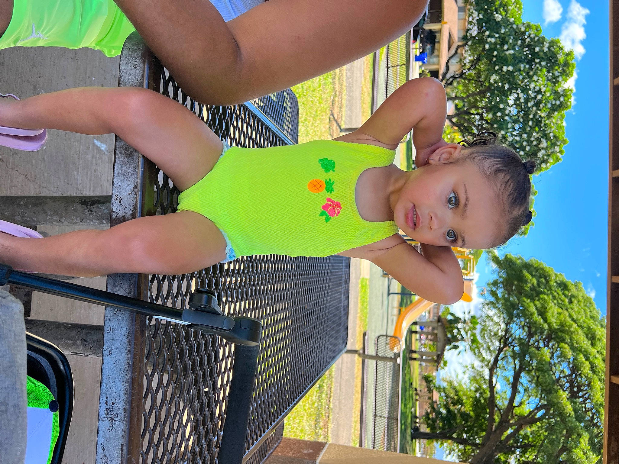 Karter Mae joined the competition — help win amazing prizes! calf, child, fence, foot, fun, grass, happy, human_leg, leisure, people_in_nature, person, recreation, sandal, shorts, sky, summer, thigh, toddler, tree, vacation