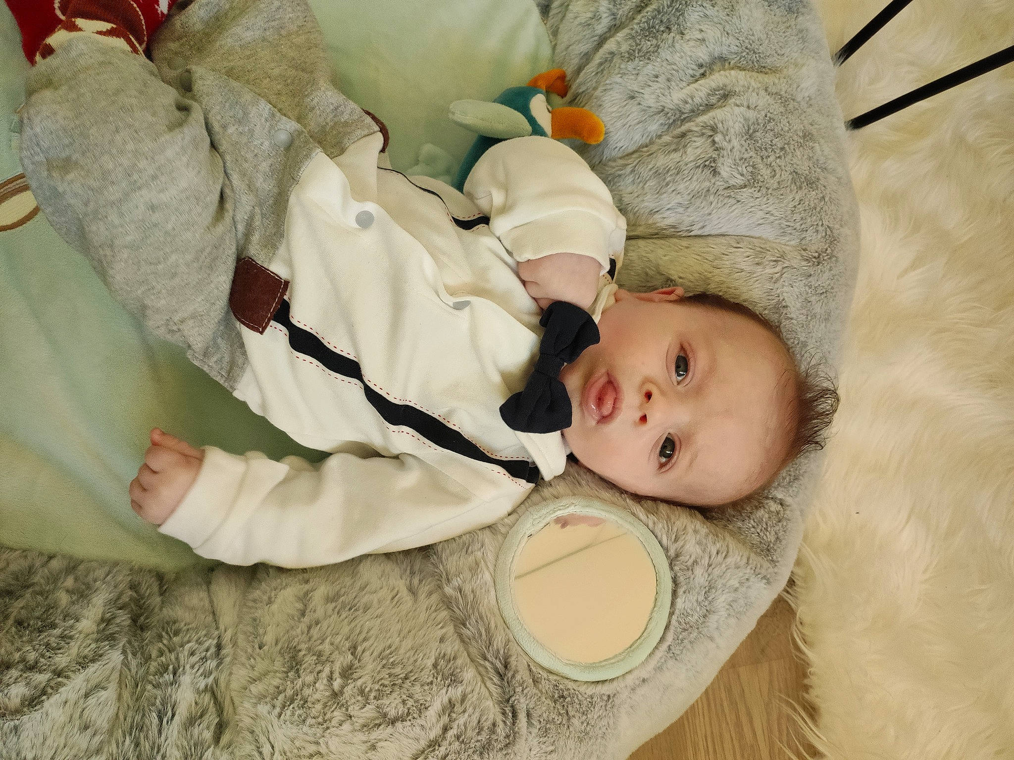 Nolan a rejoint le concours — aidez-le/la à gagner de superbes lots ! baby, baby_products, baby_sleeping, baby_toddler_clothing, bedtime, child, comfort, hat, linens, nap, person, room, skin, sleep, sleeve, toddler, wood