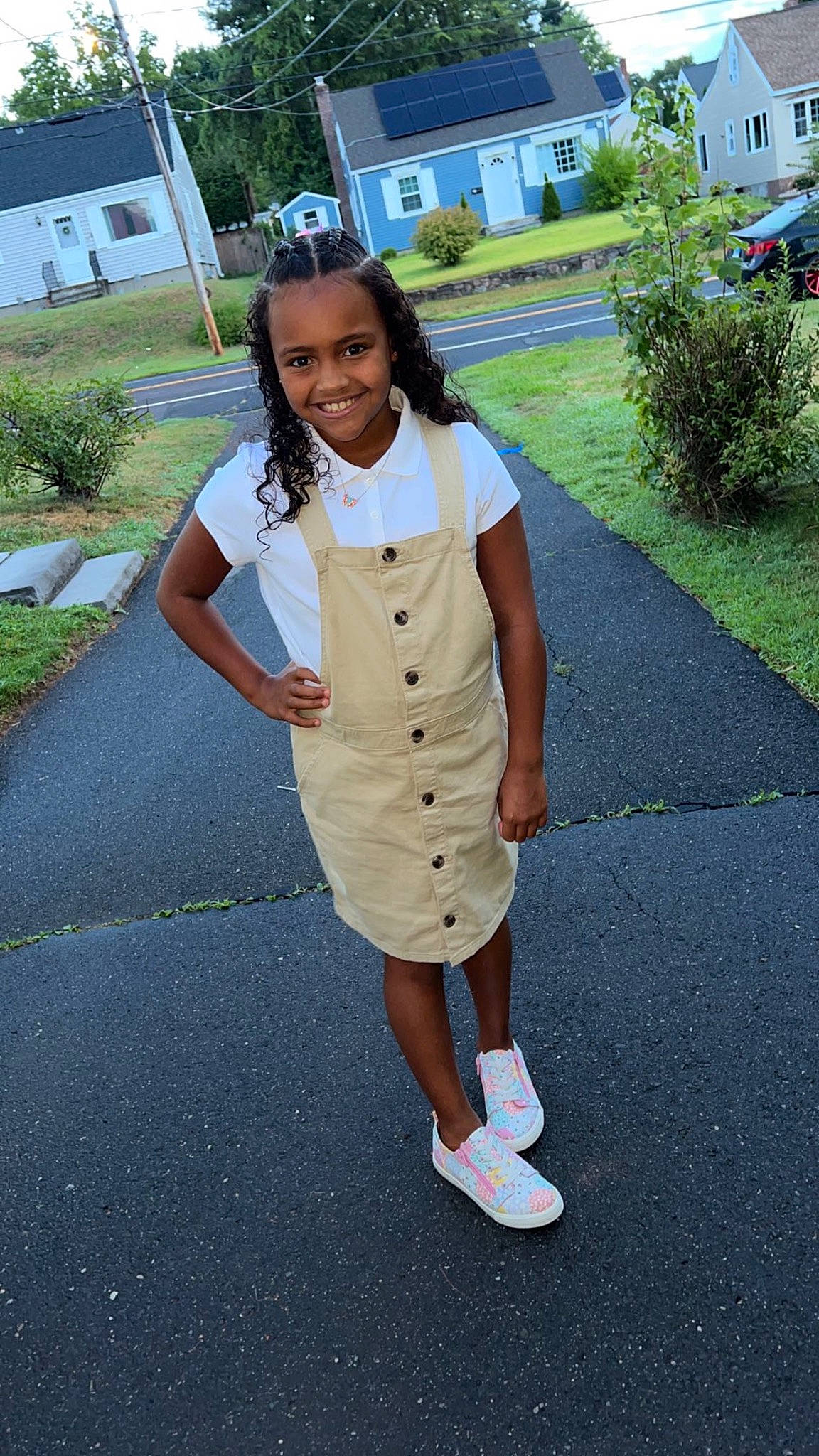 Aiyanna is registered to the contest to win money with this photo: asphalt, child, costume, electric_blue, formal_wear, fun, grass, happy, joy, knee, leisure, pattern, person, plant, recreation, school_uniform, sleeve, smile, toddler, tree