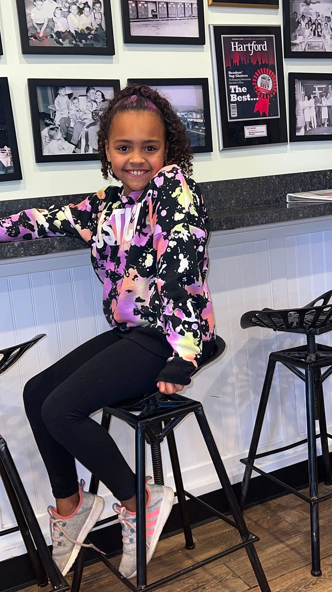 Aiyanna joined the competition — help win amazing prizes! artist, black_hair, chair, event, fashion_design, fun, human_leg, joint, joy, knee, magenta, musician, person, picture_frame, purple, room, shoulder, smile, snapshot, standing