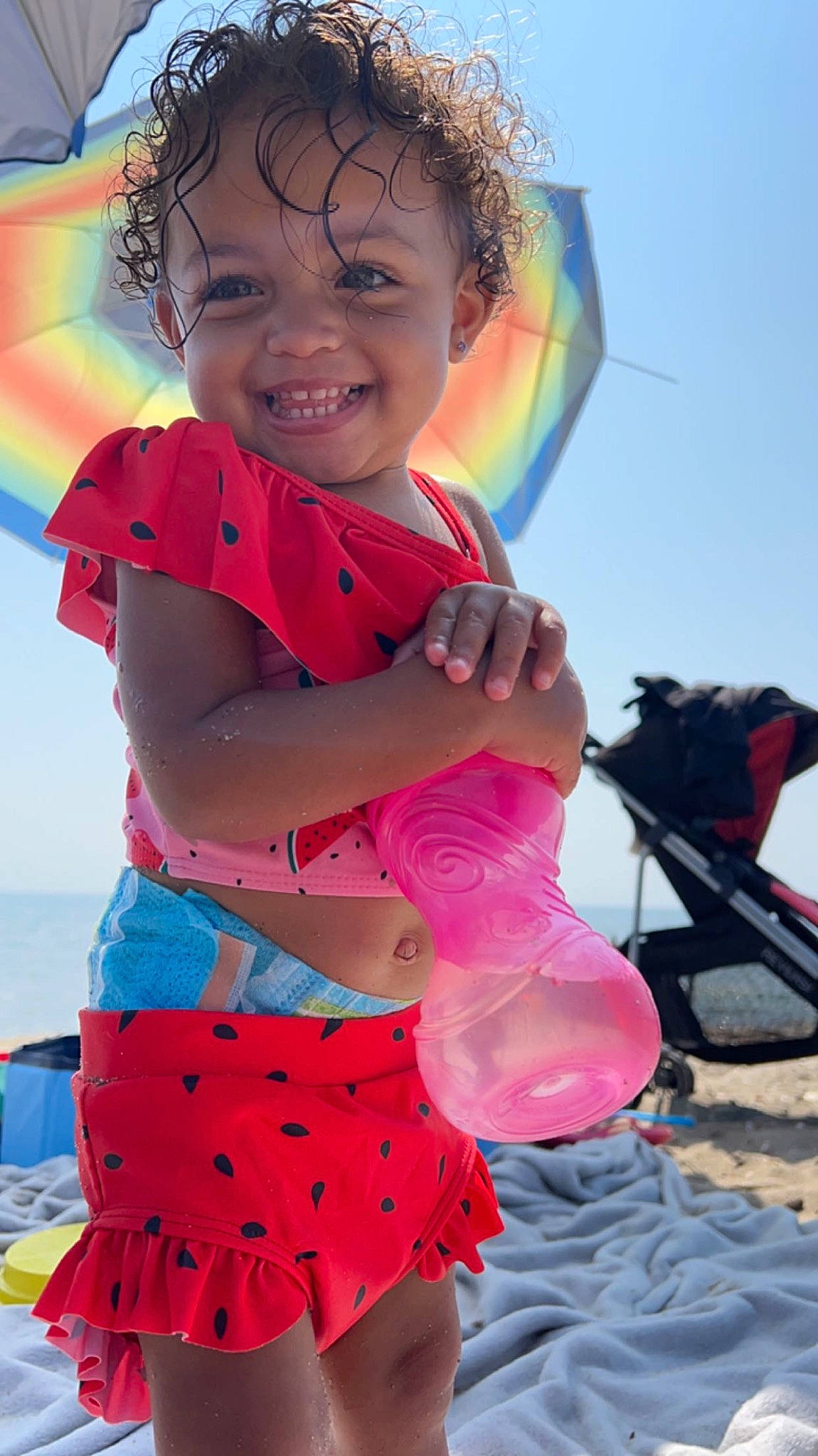 Ariyah joined the competition — help win amazing prizes! beach, beauty, child, electric_blue, facial_expression, fun, happy, joy, leisure, magenta, pattern, people_in_nature, person, photograph, pink, play, recreation, sky, smile, toddler