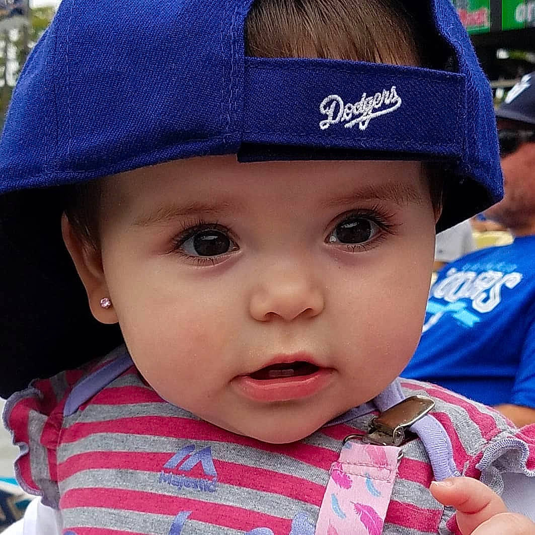 Abrielle joined the competition — help win amazing prizes! baby, baseball_cap, cap, child, clothing, cool, face, fashion_accessory, hat, headgear, headwear, person, sun_hat, toddler