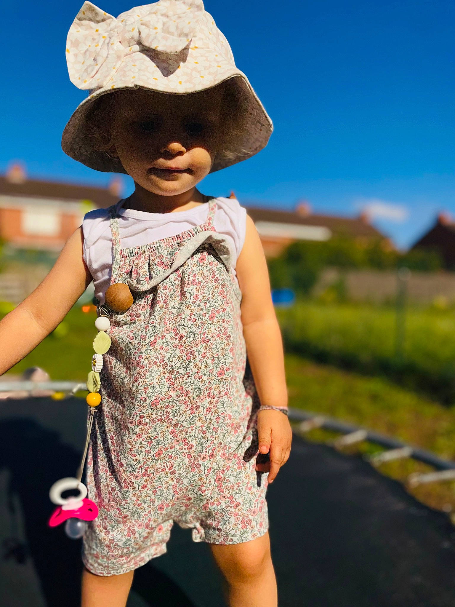 Maëly participe au concours pour gagner de l'argent avec cette photo : beauty, day_dress, electric_blue, eyewear, fun, grass, happy, hat, headgear, landscape, one_piece_garment, pattern, person, plant, shoulder, skin, sky, sun_hat, toddler, travel