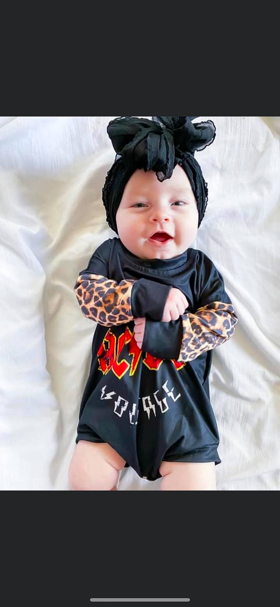 Indie joined the competition — help win amazing prizes! baby, baby_products, baby_toddler_clothing, child, collar, costume, costume_hat, fashion_accessory, fashion_design, formal_wear, happy, head, headwear, outerwear, pattern, person, personal_protective_equipment, sleeve, smile, t_shirt