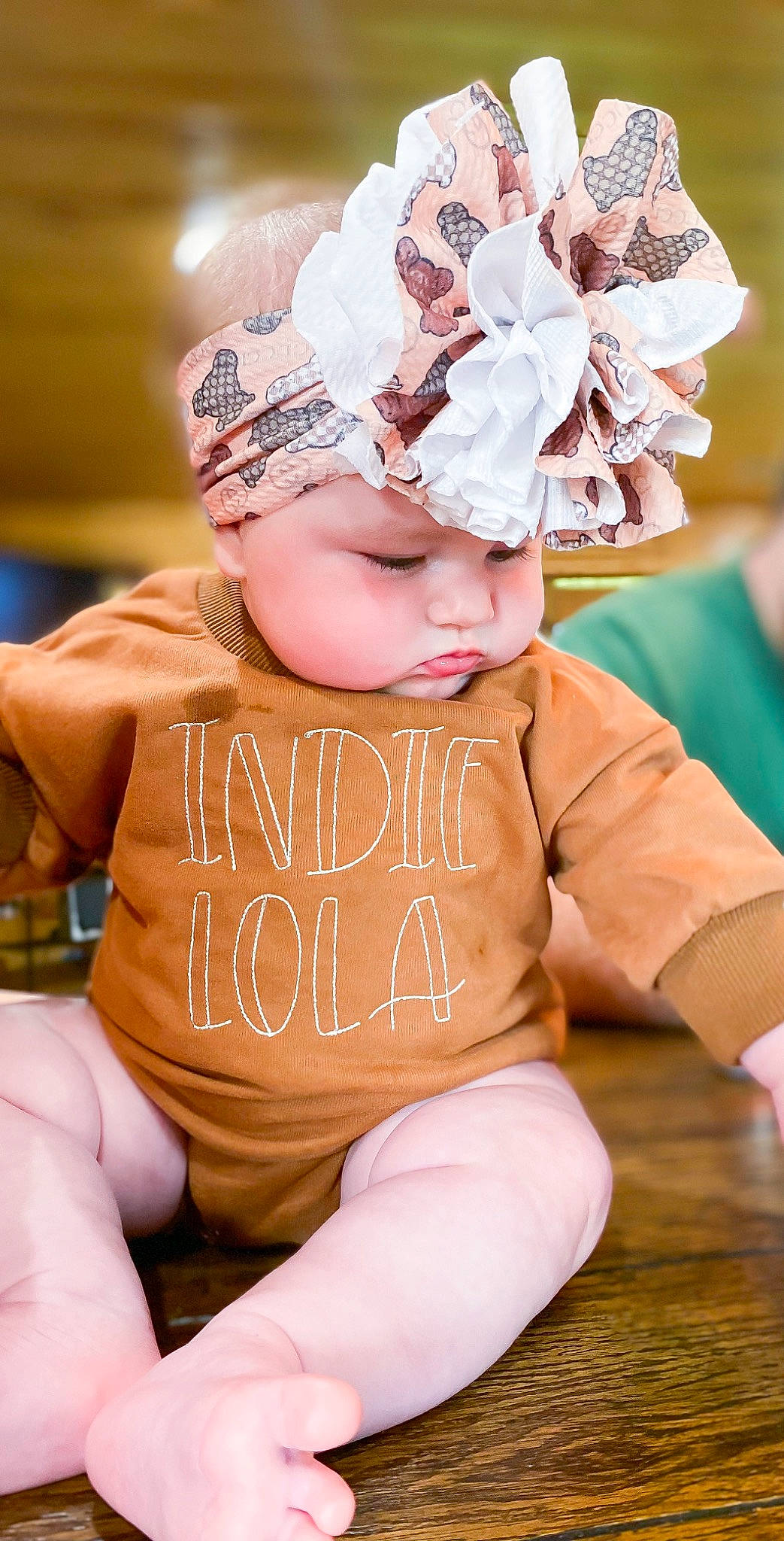 Indie joined the competition — help win amazing prizes! baby, baby_toddler_clothing, cap, child, costume_hat, event, happy, hat, headband, headgear, headpiece, headwear, pattern, peach, person, pink, sitting, skin, sun_hat, thigh