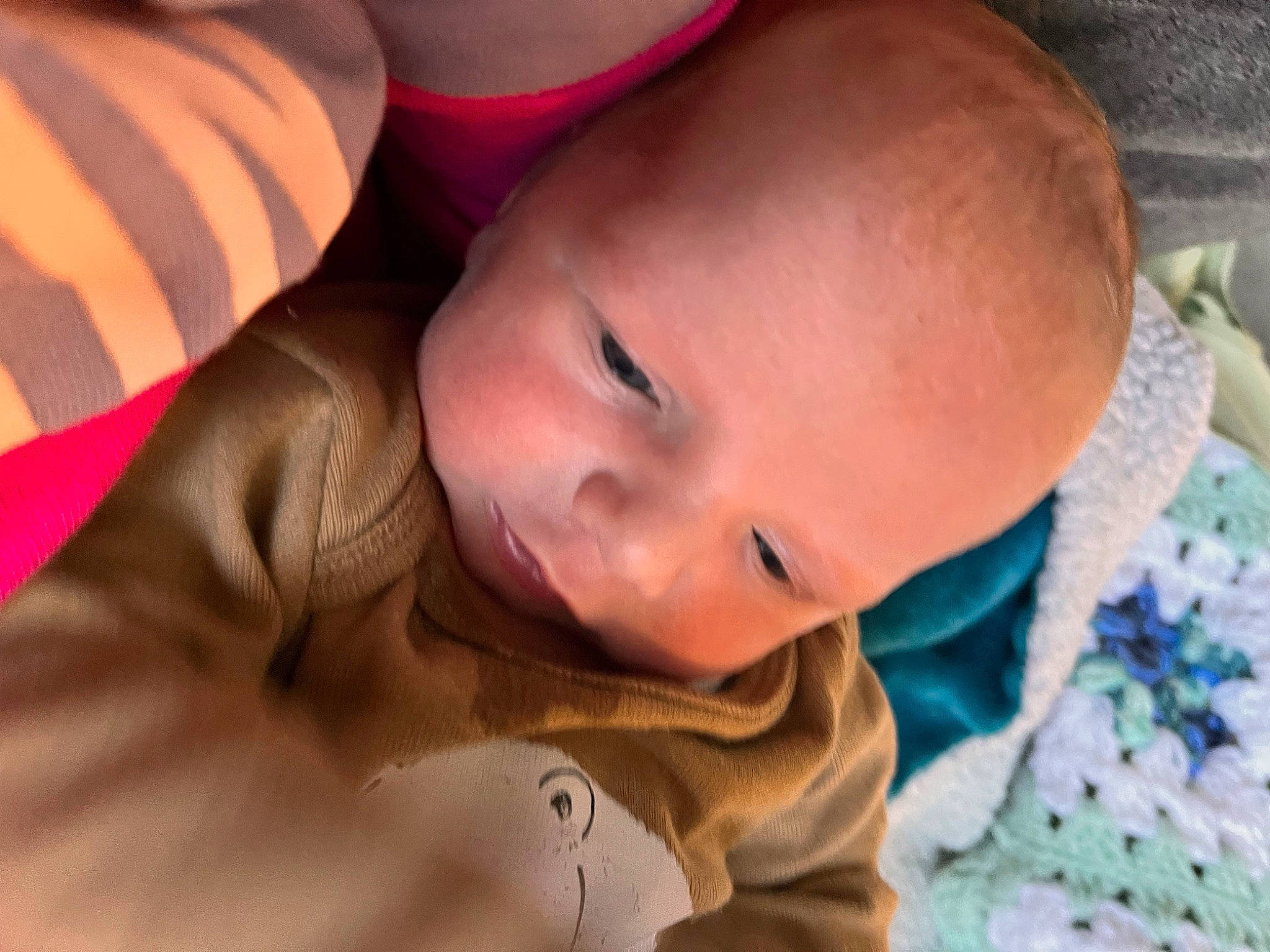 Christian is registered to the contest to win money with this photo: baby, cheek, comfort, eye, eyelash, facial_expression, finger, hair, happy, human_body, iris, lip, mouth, nose, person, skin, smile, textile, toddler, tummy_time