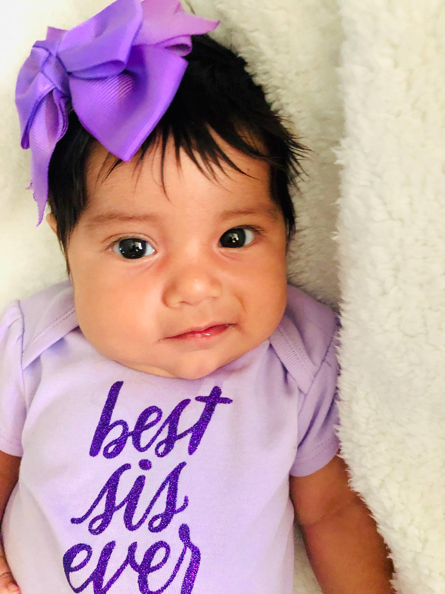 Rachel joined the competition — help win amazing prizes! baby, baby_products, baby_toddler_clothing, cheek, child, child_model, costume_accessory, fashion_accessory, hair_accessory, headband, headgear, lavender, lip, person, pink, product, purple, skin, smile, toddler