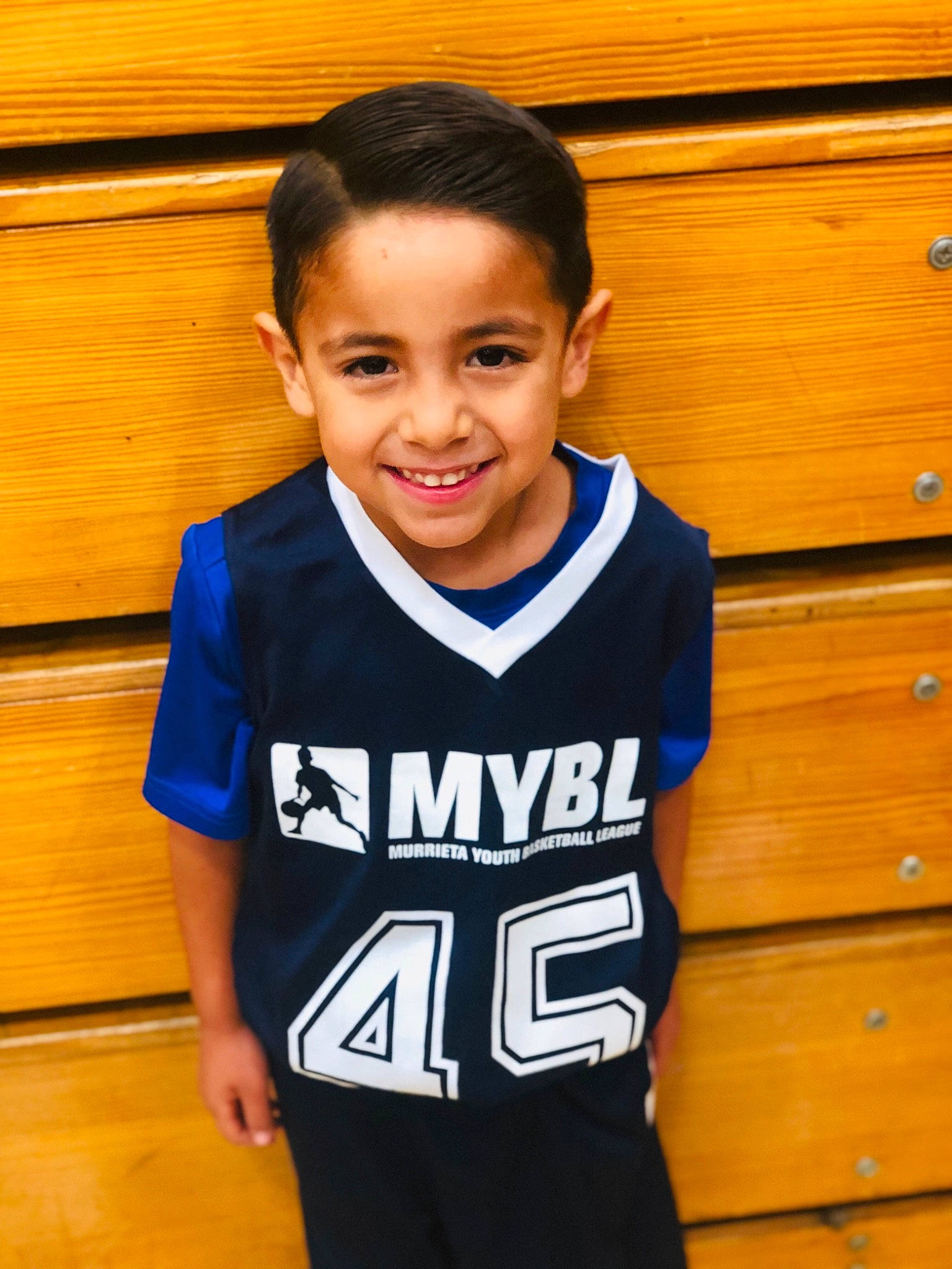 Isaiah is registered to the contest to win money with this photo: ball_game, basketball, cheerleading, cheerleading_uniform, child, competition_event, jersey, joy, person, player, smile, sports, sports_uniform, sportswear, team, team_sport, tournament, uniform