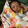 baby, sleeping, blanket, colorful, pattern, couch, child, infant, peaceful, wrapped, cozy, soft, resting, indoors, relaxing, portrait, cute, warm, young, comfort