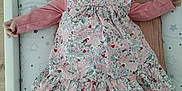 Zoey a rejoint le concours — aidez-le/la à gagner de superbes lots ! baby, bed, chair, clothing, couch, crib, cushion, dress, face, furniture, hat, head, homedecor, hosiery, infantbed, pattern, person, photography, portrait, sock