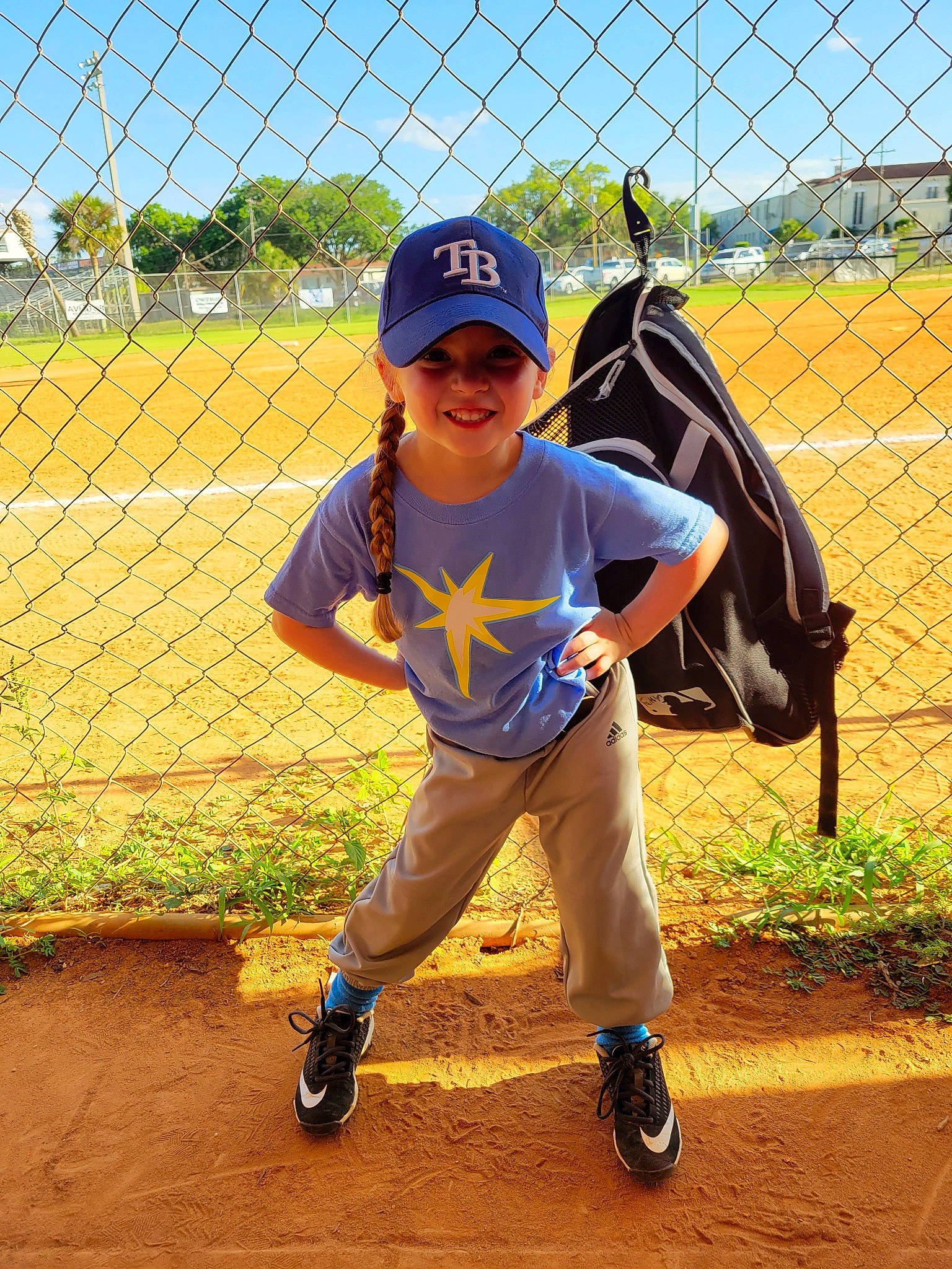 Faithlyn is registered to the contest to win money with this photo: ball_game, baseball, baseball_cap, baseball_equipment, baseball_glove, baseball_park, baseball_player, baseball_protective_gear, baseball_uniform, bat_and_ball_games, college_baseball, fence, grass, headwear, joy, mesh, person, player, sky, smile