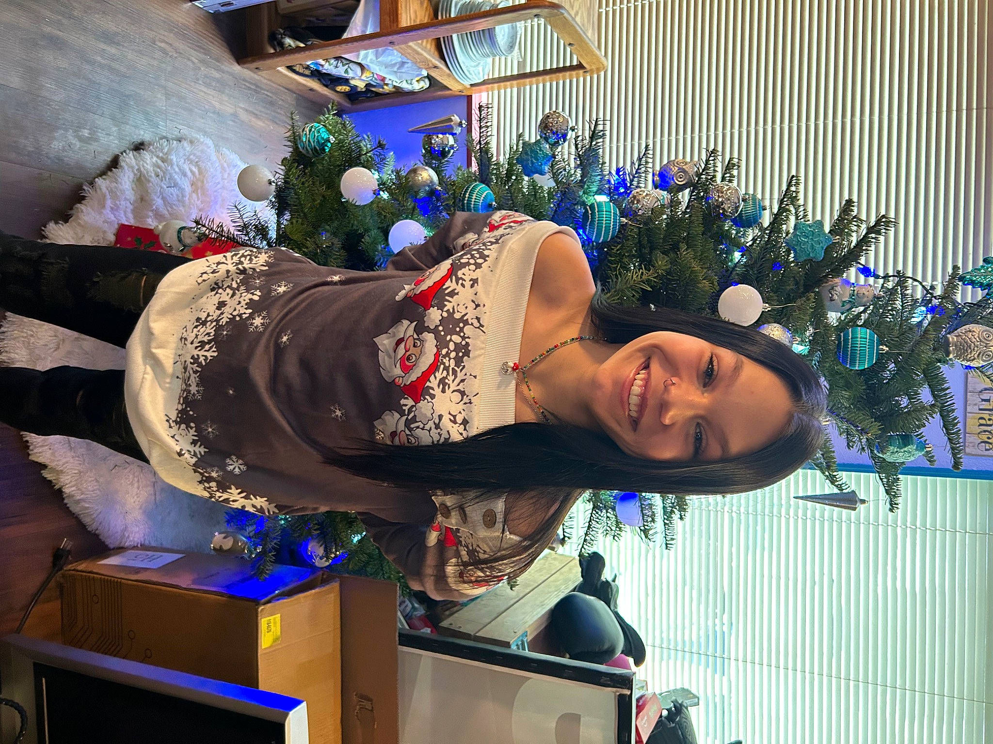 Angelique is registered to the contest to win money with this photo: abdomen, blue, costume, electric_blue, event, eyewear, fashion_accessory, fun, happy, hat, holiday, houseplant, human_leg, jewellery, joy, person, plant, room, smile, thigh