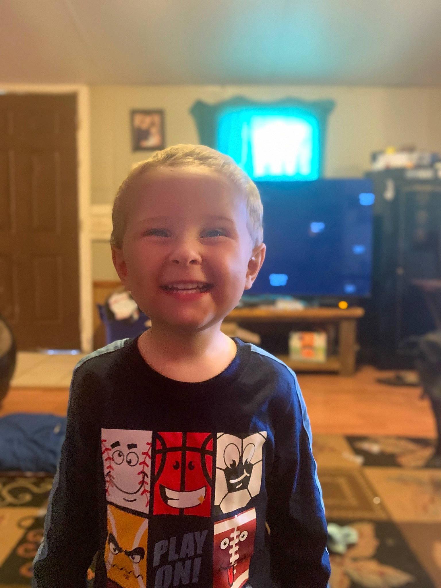 Braden joined the competition — help win amazing prizes! baby, cheek, child, chin, electric_blue, eyewear, flooring, fun, happy, iris, joy, laugh, person, play, room, sitting, sleeve, smile, standing, t_shirt