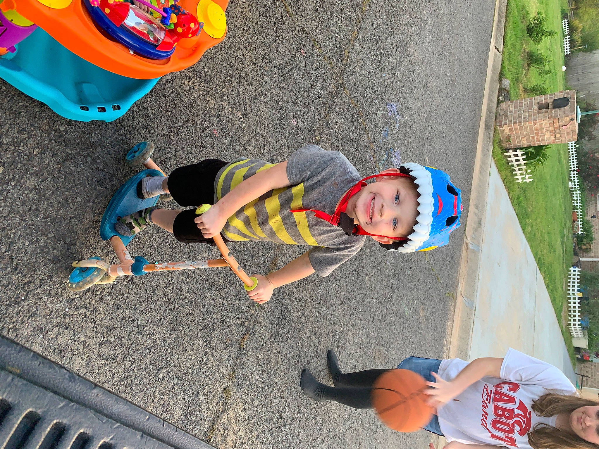 William joined the competition — help win amazing prizes! asphalt, bicycle_helmet, child, electric_blue, fun, grass, headwear, joy, leg, leisure, person, photograph, plant, play, public_space, recreation, road_surface, shorts, sidewalk, sneakers