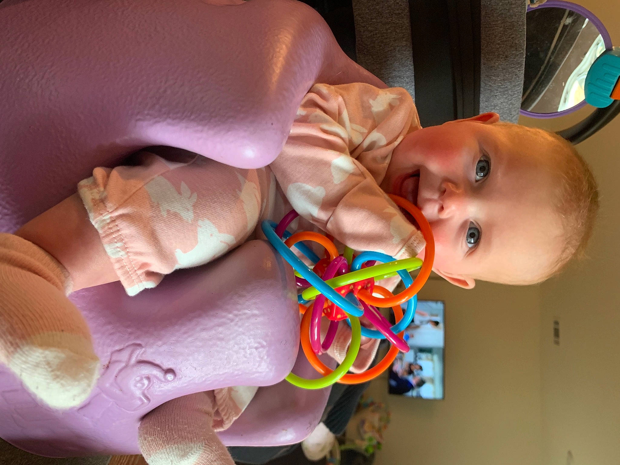 Charity is registered to the contest to win money with this photo: arm, cheek, ear, finger, hair, hand, happy, human_body, joint, leg, lip, mammal, mouth, muscle, neck, nose, orange, person, pink, skin