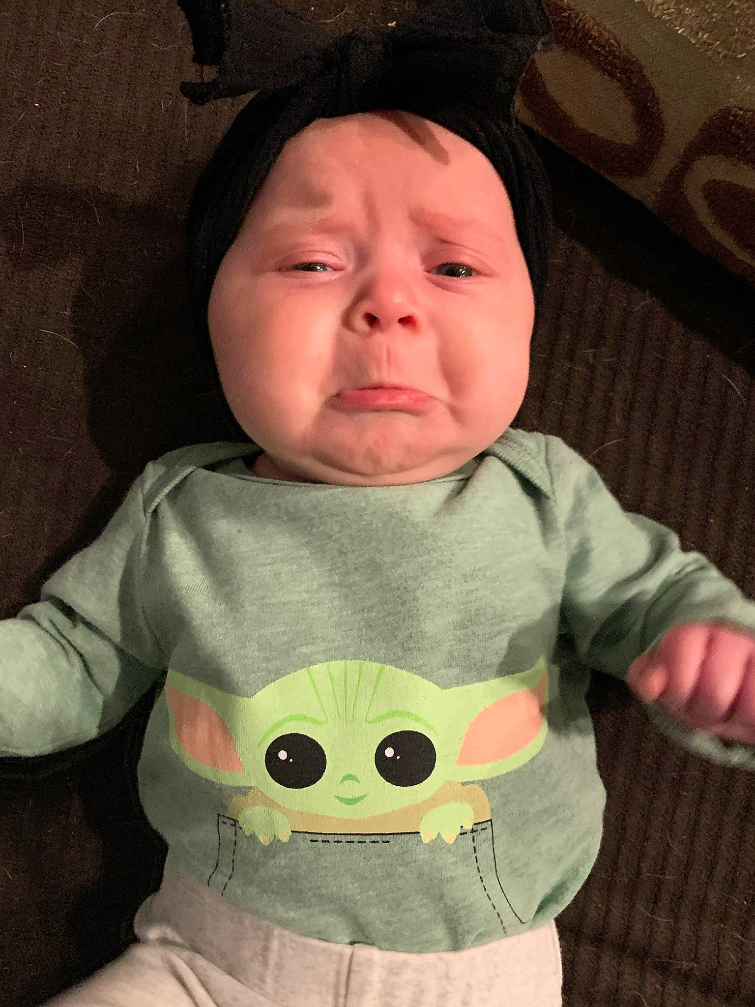 Charity is registered to the contest to win money with this photo: baby, baby_toddler_clothing, cheek, eye, eyelash, happy, head, headwear, human_body, iris, lip, mouth, neck, nose, organ, person, pink, skin, sleeve, t_shirt