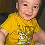 Noah is registered to the contest to win money with this photo: toddler, child, smiling, yellow_shirt, baby, indoors, happy, face, person, cute, short_hair, sitting, star_wars, graphic_tee, skin, arm, eyes, mouth, expression, diaper