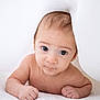 Noah joined the competition — help win amazing prizes! baby, infant, child, face, eyes, skin, blanket, white, curious, lying_down, hands, portrait, soft_light, indoors, cute, newborn, expression, head, young, toddler