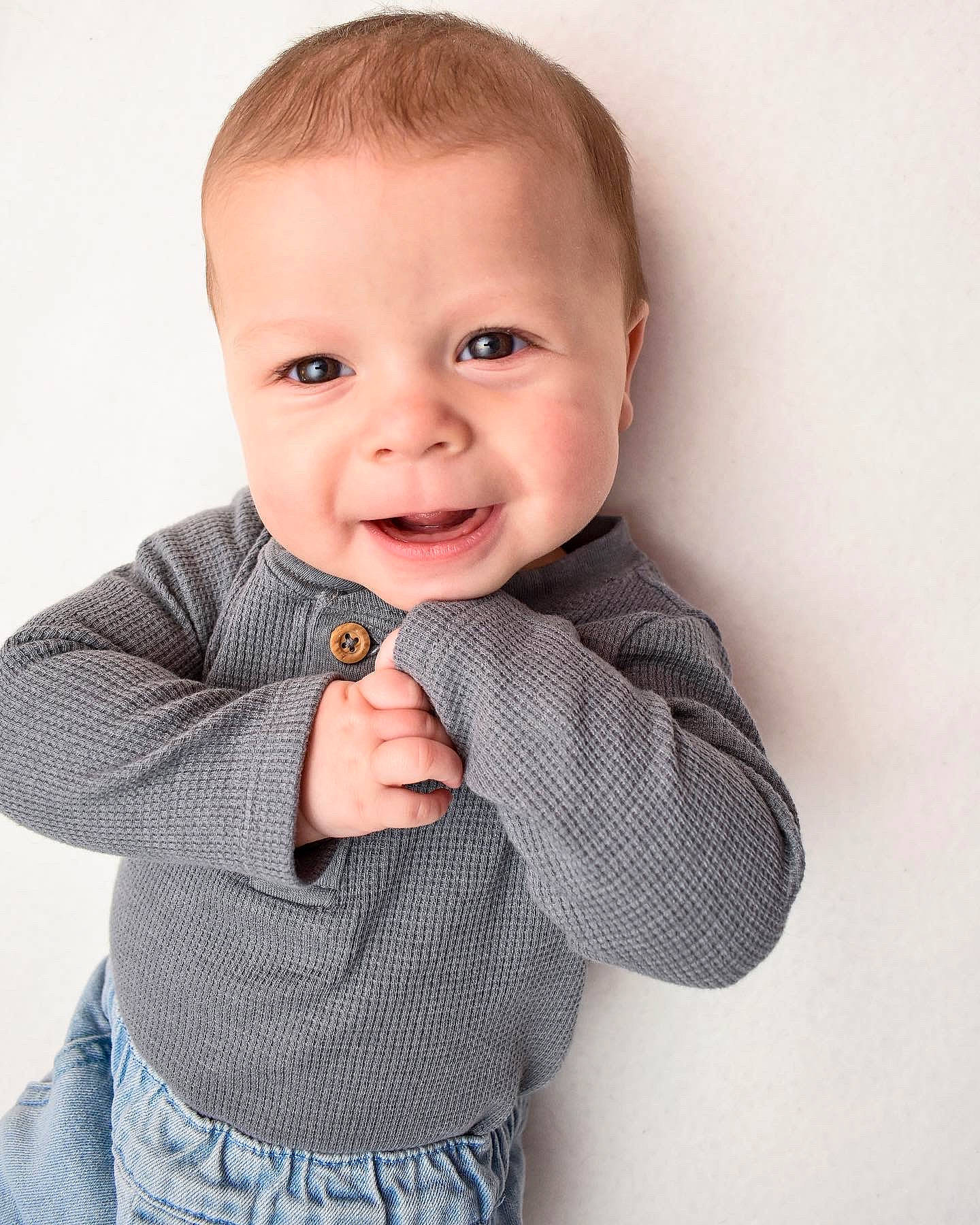 Cody joined the competition — help win amazing prizes! baby_toddler_clothing, cheek, chin, collar, dress_shirt, eyelash, face, gesture, grey, hairstyle, happy, head, lip, neck, nose, outerwear, person, skin, sleeve, smile
