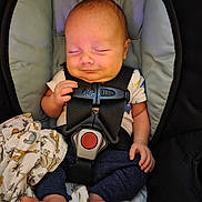 Nyxzen joined the competition — help win amazing prizes! baby, sleeping, car_seat, blanket, infant, child, safety_harness, clothing, cute, peaceful, newborn, foot, hand, fabric, pattern, comfort, indoor, portrait, rest, tiny